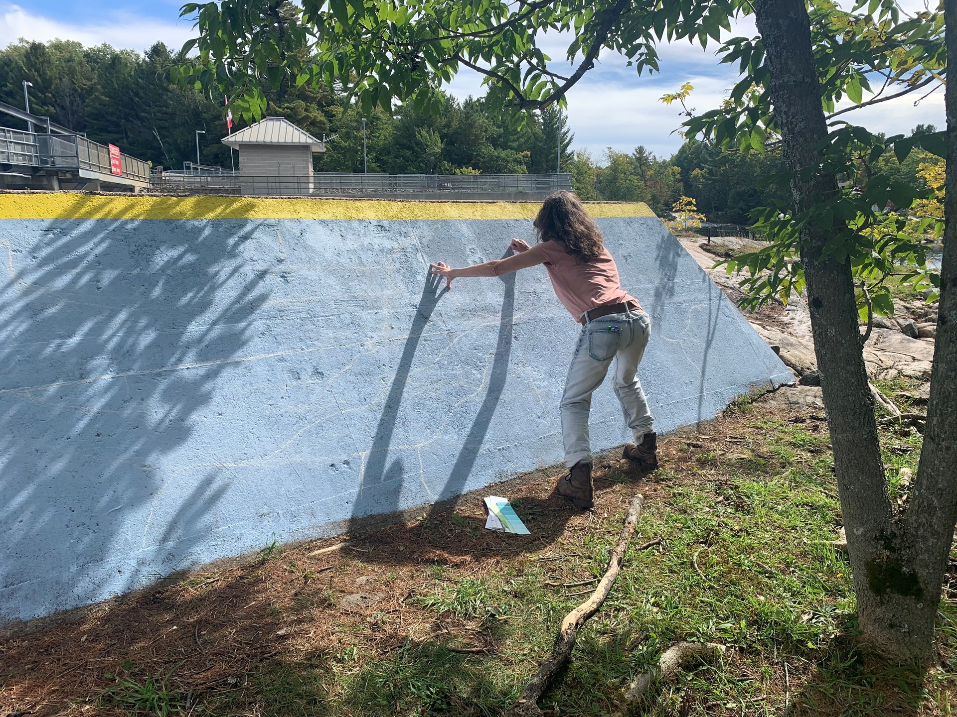 artist planning out the mural