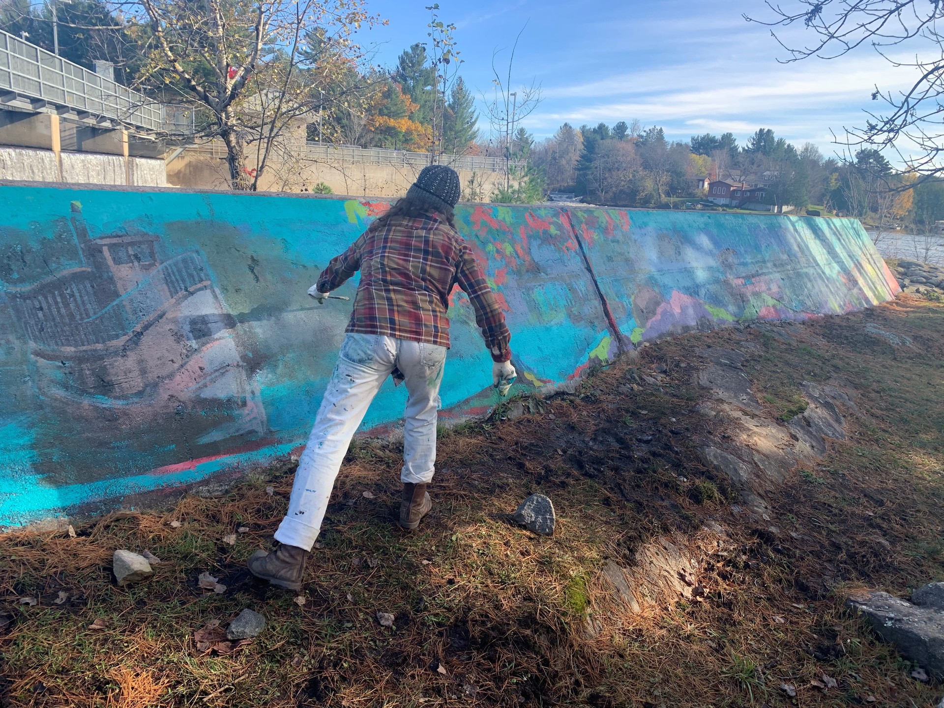artist painting the mural