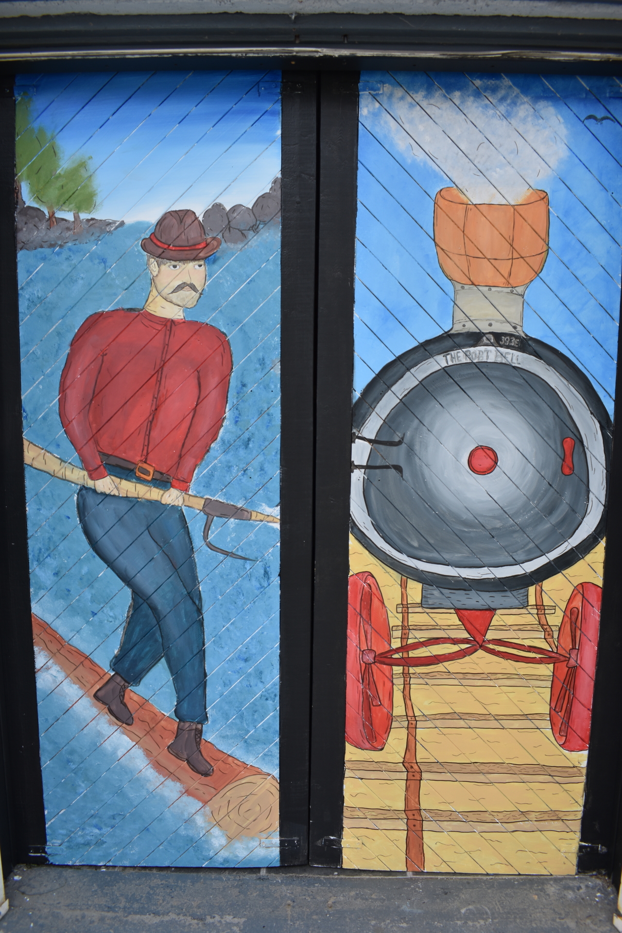 mural with a man and a train