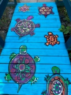 turtles painted on a bridge