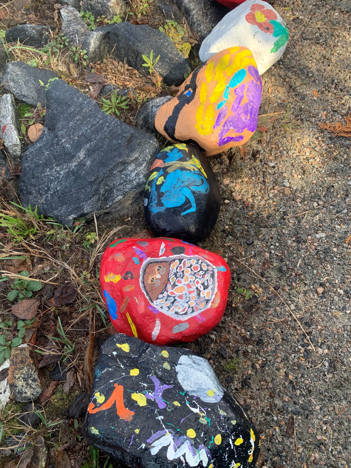 rocks with paintings on them