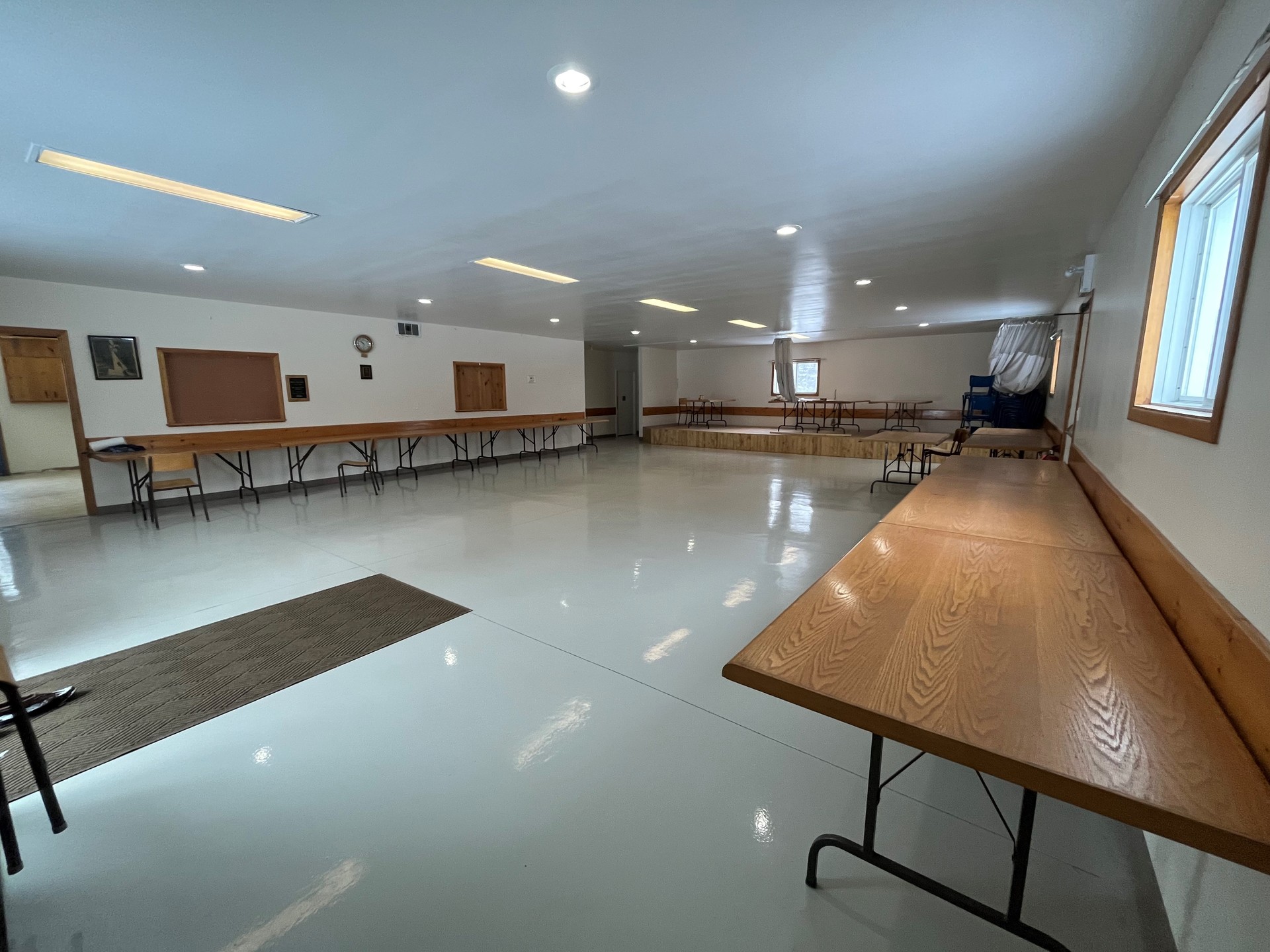 Ahmic Harbour Community Centre interior space with tables